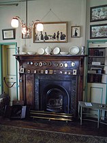 A fireplace in a reception room