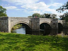 A stone bridge spanning a river