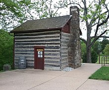 Looking South-West. The log schoolhouse was originally from Antioch Farm in Haymarket, Virginia. Moved to Sully in 1963