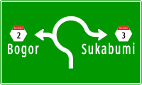 Roundabout directional sign in Indonesia.