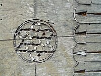 Decaying wood inlay on a chest in a Greek monastery.