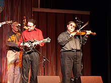 Cleveland (right) performing with Jesse Brock (left)