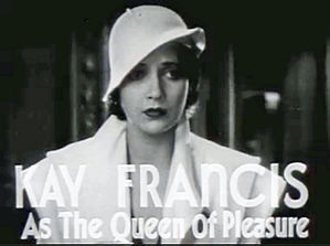 a comely brunette in a white hat and jacket is captioned as the queen of pleasure for the film The House on 56th Street.