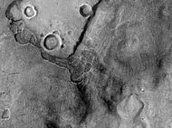 Periglacial Forms in Utopia, as seen by HiRISE. Click on image to see patterned ground and scalloped topography.