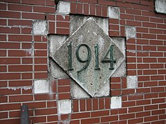 Tile on the tunnel's west portal marks year of opening