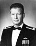 A black-and-white photo of an older white man in his military dress uniform