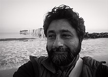 image shows Anjan Chatterjee at the shore. He took this picture of himself