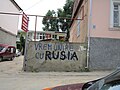 Graffiti in Chișinău. The original reads "We want union with Romania", but "Romania" was later painted over with "Russia".