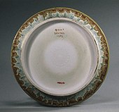 Back of previous dish, with marks