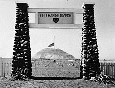 5th USMC Division Cemetery entrance built by the 31st CB with Mt. Suribachi center.
