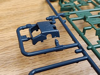 Parts have to be cut away from the sprue