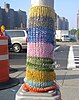 Utility pole warmer on NYC street.