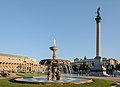 Fountain on Schlossplatz with the Königsbau in the background.