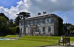 Tregrehan House and attached steps and parterre walls with urns