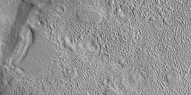 Close view of dipping layers, as seen by HiRISE under HiWish program. Brain terrain is also visible in the image.