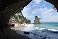 View through rock arch towards Te Hoho Rock in Cathedral Cove