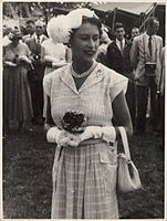 Queen Elizabeth at a garden party held in her honour at Home Island (1954).