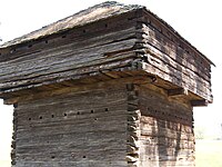 A blockhouse fort similar to the one used by Captain James Ford when he was in command of the Grand Pierre area militia, 4th Regiment of Illinois Territorial Militia, January 2, 1810, which may have used later by the Sturdivant Gang in 1820s-1830s for their counterfeiting operation overlooking the bluff of the Ohio River at Rosiclare, Illinois