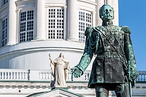 Close-up from the front with Helsinki Cathedral's John the Apostle in the background