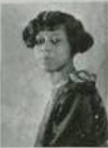 A young Black woman with hair cut in a bob with a side part