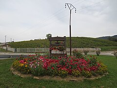 Ancien pressoir à vin, devant le clos