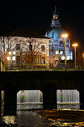 The palace at night in the spring, seen from the banks of the Leine at the Leineschloss.