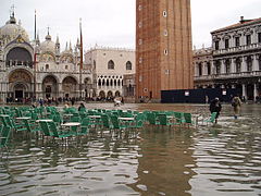 Tidal flooding. Sea-level rise increases flooding in low-lying coastal regions. Shown: Venice, Italy (2004).[269]