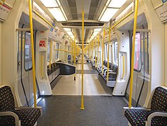 An interior of a Circle line S7 Stock in London