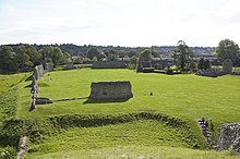 A train passes Berkhamsted castle, on an embankment that was once part of the castle's outer defences