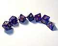 Image 5D&D uses polyhedral dice to resolve in-game events. These are abbreviated by a 'd' followed by the number of sides. Shown from left to right are a d20, d12, d%, d10, d8, d6, and a d4. A d% and d10 can be rolled together to produce a number between 1 and 100. (from Dungeons & Dragons)