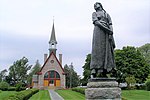 Grand Pré memorial church and statue of Évangeline.