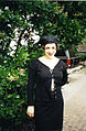 Image 28Woman dressed in black maxi skirt, top and hat, 1995. (from 1990s in fashion)