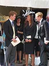 Middleton in conversation with Prince Harry outside St George's Chapel, Windsor Castle