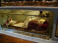 The body of The Blessed Pope John XXIII can be seen inside his tomb.