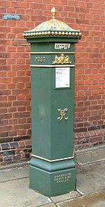 Original bronze-green livery Penfold on High St Rochester, Kent showing enamel Letters flap.