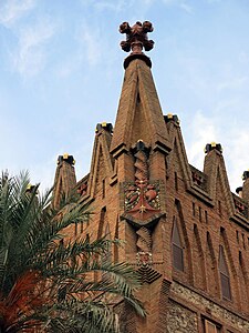 Gothic Revival reinterpretation of a fleuron on the College of Saint Teresa-Ganduxer, Barcelona, Spain, by Antoni Gaudí i Cornet and Joan Baptista Pons i Trabal, 1887-1889