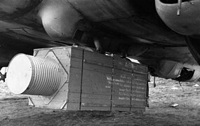 Food supply crate mounted under a German He 111 bomber, 1944