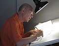 Ed Subitzky working on a comic strip for JCS in 2012