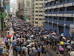 Participants in the rally marched through Yeung Uk Road in the rain, occupying all traffic lanes.