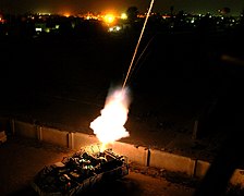 The M1129 being fired at night