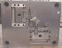 "B" side of die with side pull actuators