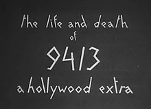 A gray screen with the words "the life and death of 9413 a hollywood extra" written in white text, in an angled, jagged font.
