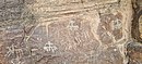 Anamorphic and zoomorphic petroglyphs at Wadi Shie