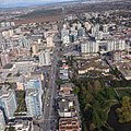 East-facing aerial view of Westminster Highway and Canada Line overpass to Brighouse Station in Richmond, British Columbia