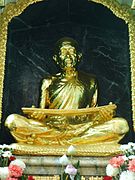 A statue of Ariyavangsagatayana (Sa Pussadeva), the first abbot of this temple