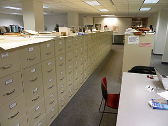 This is a view of only some of the file cabinets, divided by county, containing informational files on all buildings of historical note in the great state of Minnesota, particularly those identified in the vast Minnesota Historic Properties Inventory as well as the smaller set of buildings listed on the National Register of Historic Places.