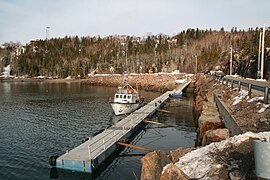 Crab fishing boat at Fisheries and Oceans Canada’s pontoons,[13] Anse aux Basques[14]