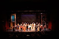 One of the qualities of a megamusical is having a large ensemble cast, as seen in Les Misérables.