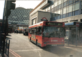 A picutre of a Morden bus in the year 2004.