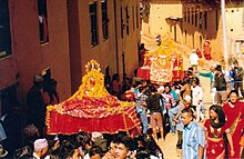 Men carrying portable shrines of goddesses Mahakali (foreground) and Palanchok Bhagwati through the streets of Sathighar Bhagawati village in Kavrepalanchok, Nepal during the festival of Palanchok Bhagwati Jatra on 25 October 2012.